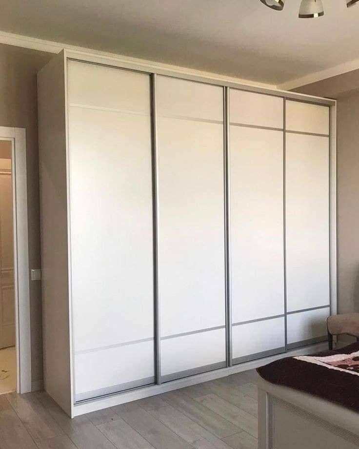 White Wide and Functional Living Room Wardrobe Design